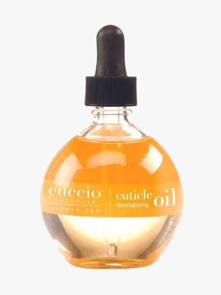 Cuccio Revitalizing Cuticle Oil in branded component on a light gray background